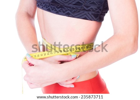 Perfect waist measure showing weight loss using a centimeter - isolated on white.