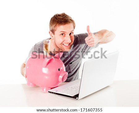 man sitting with a piggybank and laptop thinking about saving online and spending his hard money on a white background .