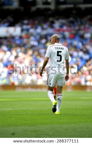 MADRID, SPAIN - June 14th, 2015 : ZINEDINE ZIDANE former legendary player of Real Madrid in action during Real Madrid vs Liverpool Legends friendly match at Santiago Bernabeu Stadium
