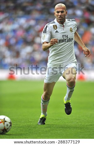 MADRID, SPAIN - June 14th, 2015 : ZINEDINE ZIDANE former legendary player of Real Madrid in action during Real Madrid vs Liverpool Legends friendly match at Santiago Bernabeu Stadium