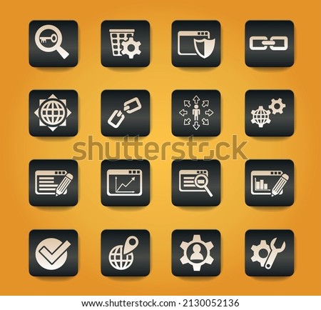 seo and development symbols on black buttons on yellow background