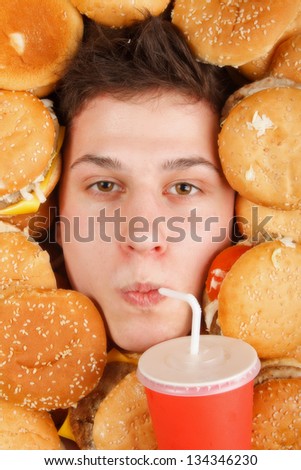 man eating hamburger