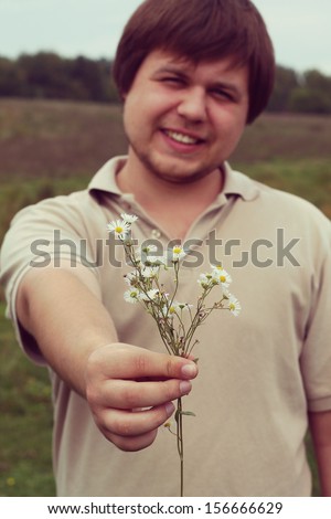 man gives flowers