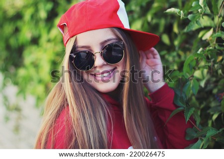 Fashion party girl wearing swag hats and sunglasses. Modern lifestyle concept. Photo toned style instagram filters.
