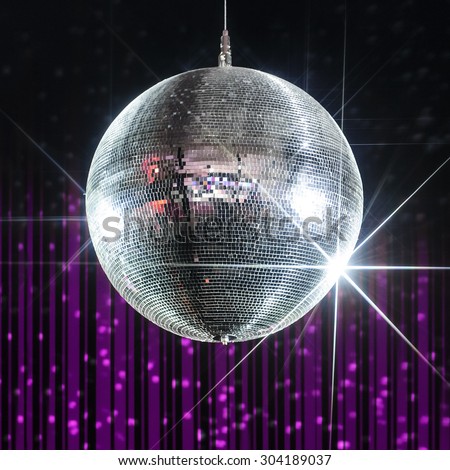 Silver disco ball with stars in nightclub with striped violet and black walls