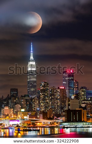 Lunar eclipse above New York City skyline