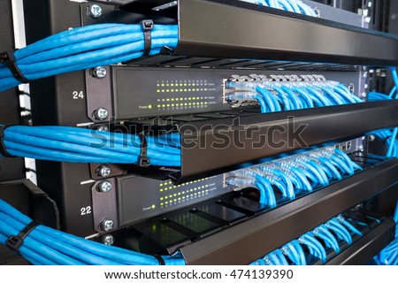 network switch and ethernet cables in rack cabinet | ez canvas