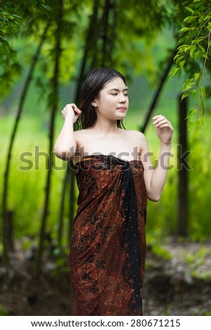 asian woman get wet