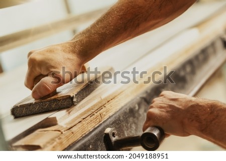 Similar – Image, Stock Photo Saws details of furniture with a circular saw. circular saw for cutting wood.
