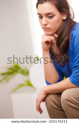 young woman thinking about what\'s going to happen to her life or her future or job
