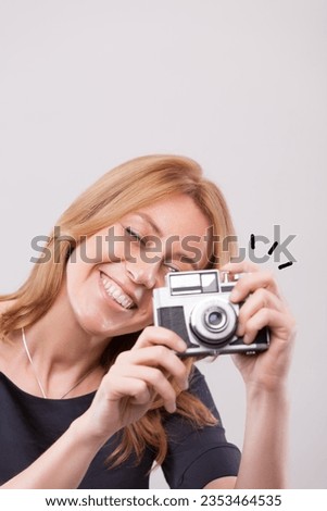 Similar – Image, Stock Photo Analog, close up portrait of a young woman sitting on a bed and looking into the camera