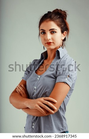 Similar – Image, Stock Photo Young Woman Tying Back Hair and Smiling in Bathroom