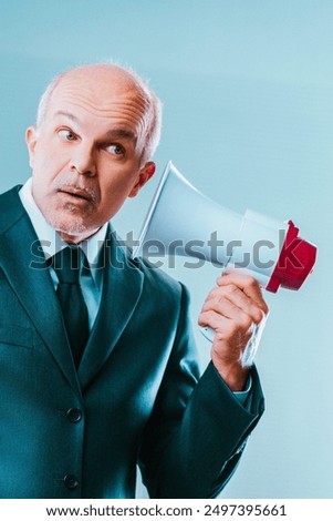 Similar – Image, Stock Photo Puzzled senior businessman in stylish formal wear at shopping plaza