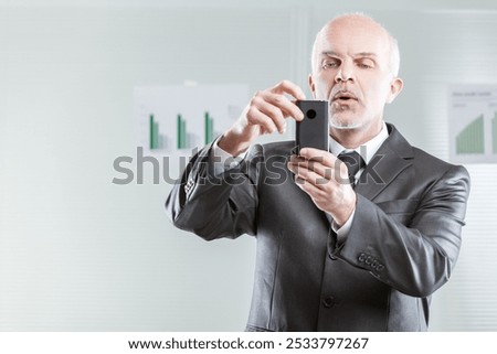 Similar – Image, Stock Photo Puzzled senior businessman in stylish formal wear at shopping plaza