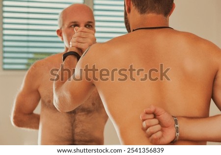 Similar – Image, Stock Photo Martial art practitioners fighting with sticks