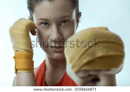 Similar – Image, Stock Photo Female boxer punching camera