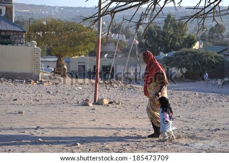HARGEISA, SOMALIA - JANUARY 12, 2010:Unidentified Somalis in the streets of the city of Hargeysa. City in Somalia, capital of unrecognized state of Somaliland. Much of the population lives in poverty.