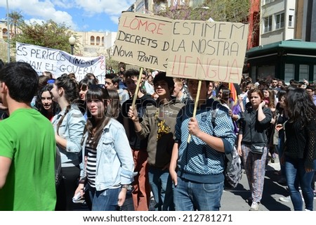 ALICANTE, SPAIN - MARCH 27, 2014: Protest demonstration of university students and college students in Alicante  Alicante - city in  Valensiysky Autonomous Region, capital of the Province of Alicante.
