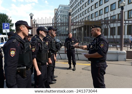 MOSCOW, RUSSIA - AUGUST 8, 2013:  Instructing police officers. Patrol and inspection service of the police provides public safety in the capital.