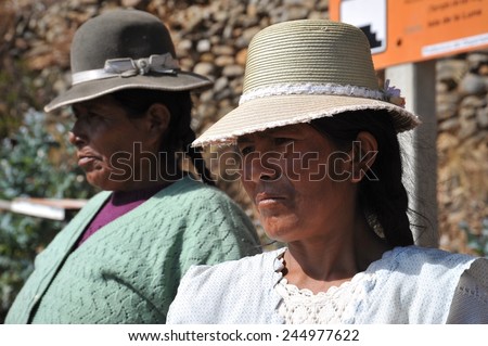 ISLAND OF THE MOON, BOLIVIA - SEPTEMBER 4, 2010 : Island of the Moon is located on lake Titicaca. Incas live here in seclusion. Unknown women on the island of the Moon.
