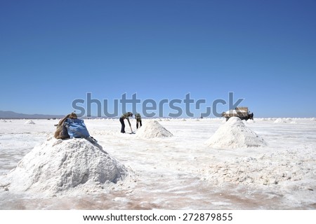 UYUNI LAKE, BOLIVIA - SEPTEMBER 9, 2010:Salt production on the Uyuni salt flats, dried up salt lake in Altiplano. The largest salt flat in the world. Every year it produces about 25 thousand tons.salt