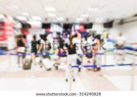 Blurred crowd of passenger check in at the air port