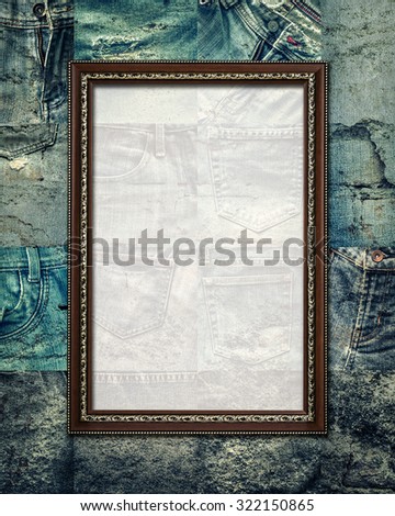Vintage picture frame on collage set of rotten jeans background