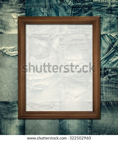Vintage picture frame on collage set of jeans background