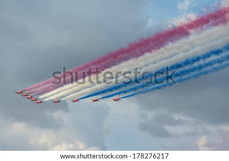 Sunderland, UK - July 27th 2013: The RAF red arrows create smoke trails at the Sunderland air show 2013.