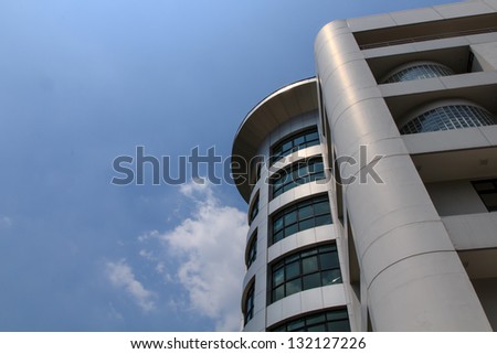 Modern building on blue sky background