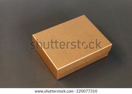 Brown paper box isolated on black background