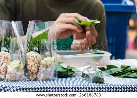 Food wrapped in leaves or Miang Kham sold as local market, Thailand-2