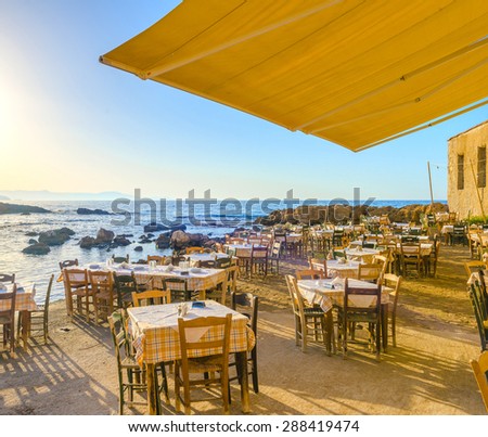 Traditional greek tavern by the sea in Chania, Greece