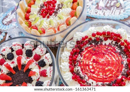 delicious colorful fancy cakes with different fruits