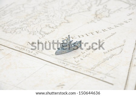 Vintage map with metal ship sailing