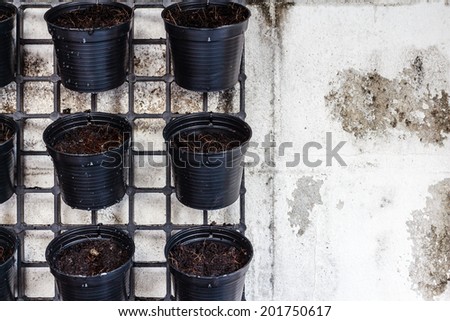 vertical garden black plastic pot