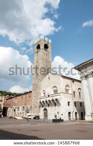 An old palace with tower in the principal square of Brescia, Italy