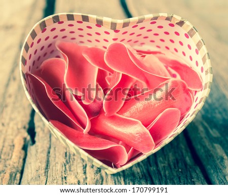 Heart shaped Valentines Day gift box with flower