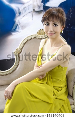 beautiful woman wearing yellow wedding dress