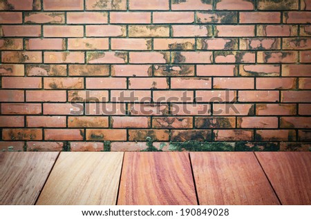 Hard wood floor and brick wall texture background .