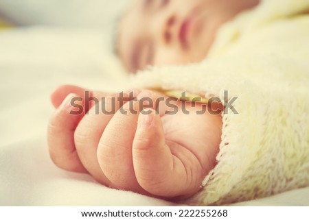 close up of Baby hand the sleeping .Vintage style
