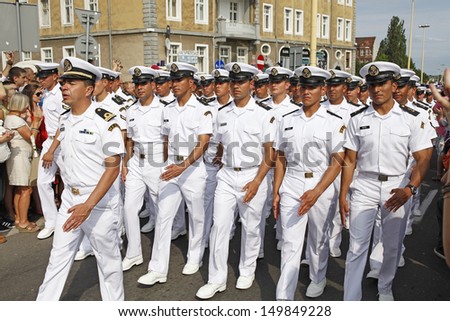 SZCZECIN, POLAND - AUGUST 4th: Crew Parade during the Final of The Tall Ships Races 2013 in Szczecin, the crew of Mexican ship Cuauhtemoc paraded through the streets of Szczecin, Poland.