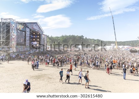 KOSTRZYN NAD ODRA, POLAND - AUGUST 1, 2015: Main stage of the 21th Woodstock Festival Poland (Przystanek Woodstock), one of the biggest ticket free rock music festivals in Europe.