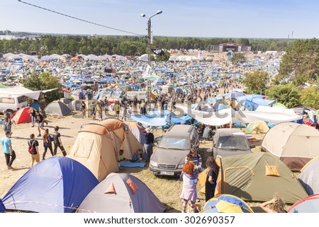 KOSTRZYN NAD ODRA, POLAND - AUGUST 1, 2015: Tent village and resting area on the 21th Woodstock Festival Poland, one of the biggest open air festivals in Europe.