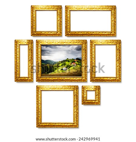 Antique golden frames collection on white background. Gallery wall ideas. Middle object with clipping path