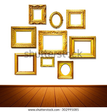 Antique golden frames on the wall. Art gallery. Objects group on white background