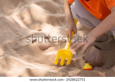 Similar – Image, Stock Photo Joyful couple on playground against grassy field