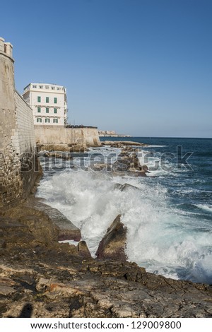 Italy. rocks and waves. Off the coast of syracuse