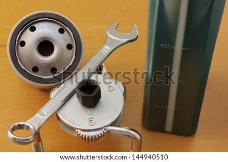 Oil filter, filter wrench and other tools for oil-change.