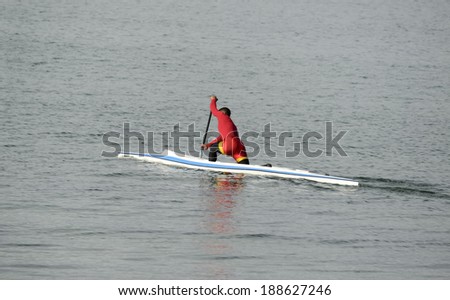 Young man and rower. Water sport